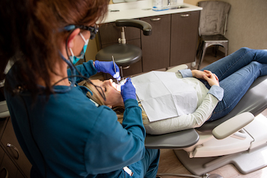 a patient getting a teeth cleaning